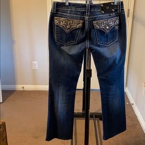 Dark rinse faded Miss Me jeans size 30.
